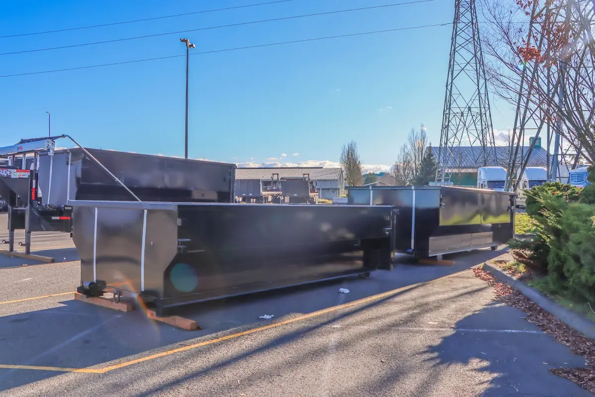 Roll-off dumpster ready for waste disposal at job site for 12 Yard Dumpster Rental in Mesquite